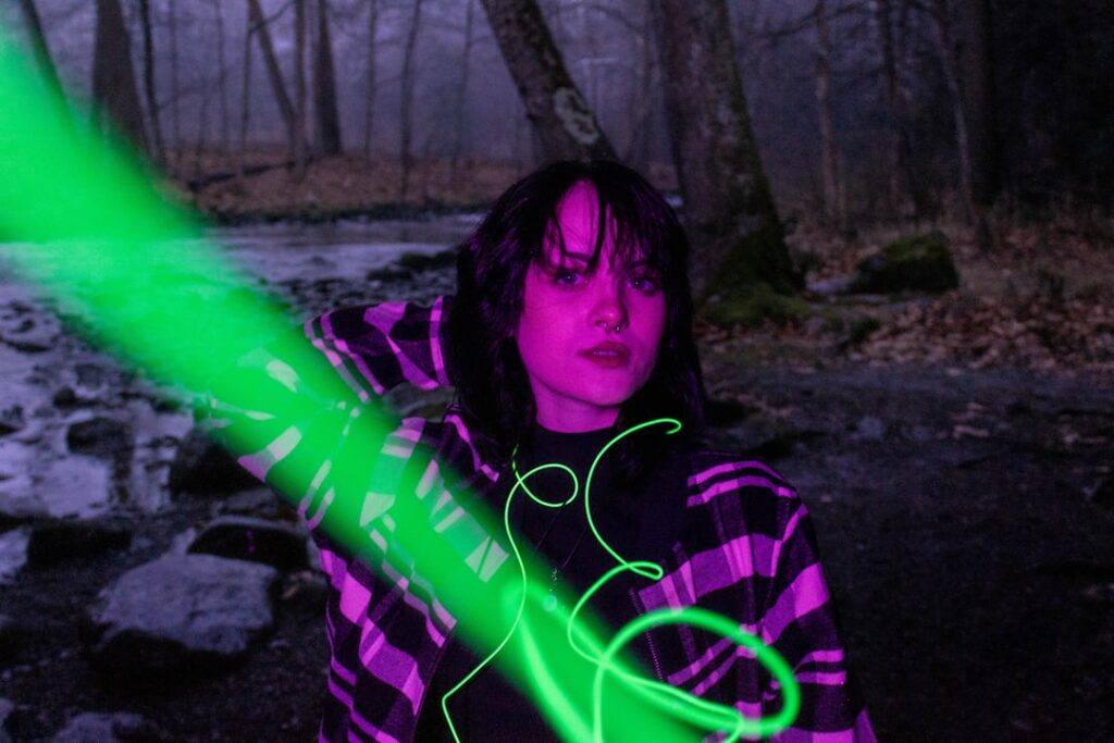 Professional's hand touching a glowing, futuristic digital screen, symbolizing the shift towards an AI-driven marketing la...