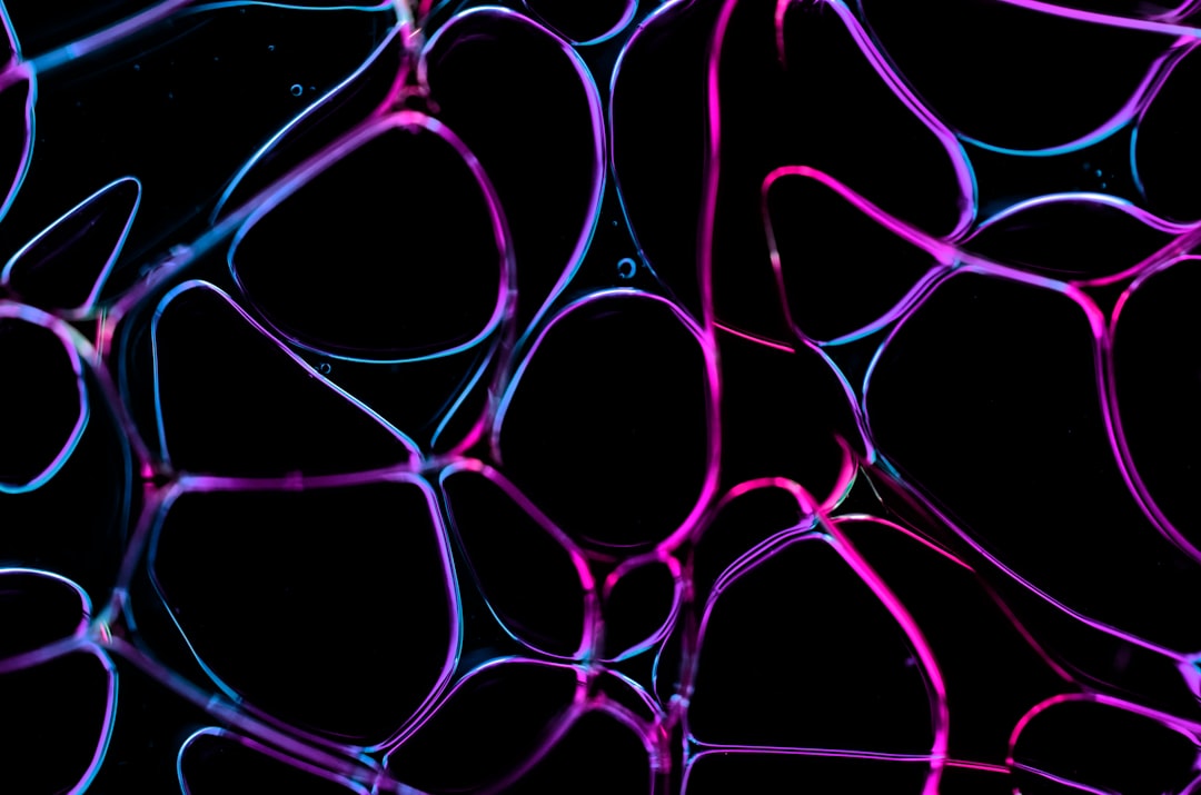 An abstract, futuristic image of a glowing blue neural network, illustrating how Google's AI understands the relationship between concepts in Entity SEO.