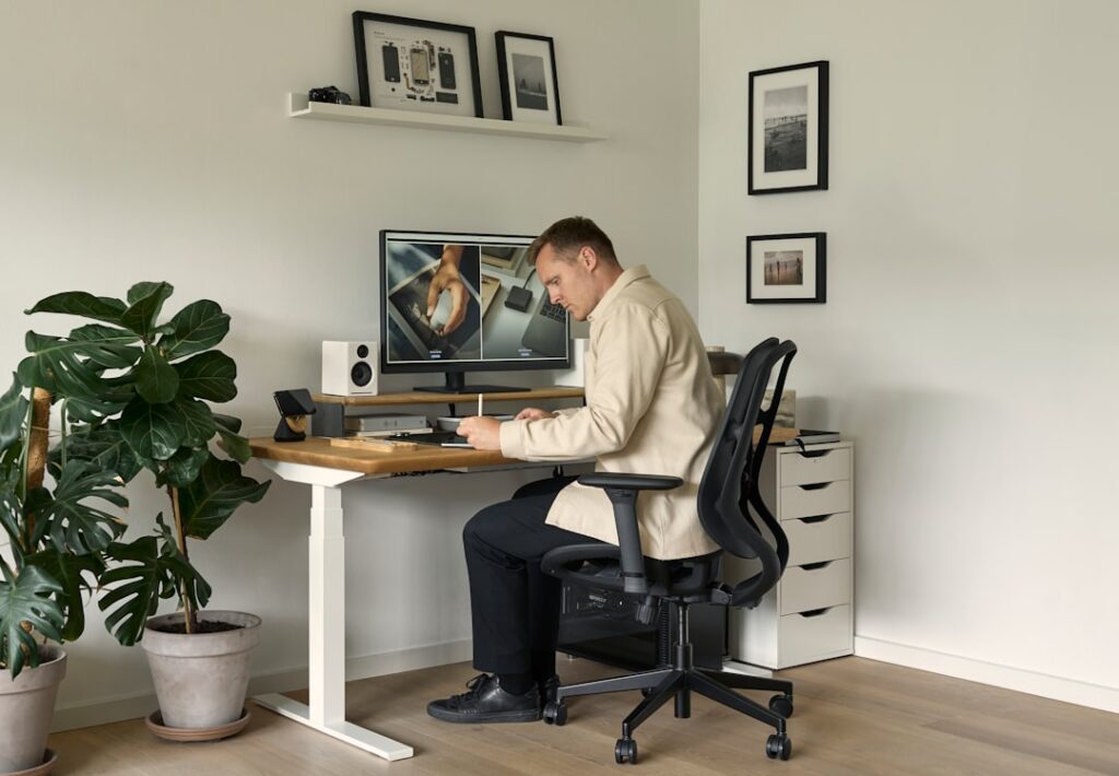 Bright, modern office desk with a laptop open next to a sleek calculator, symbolizing the connection between digital marke...