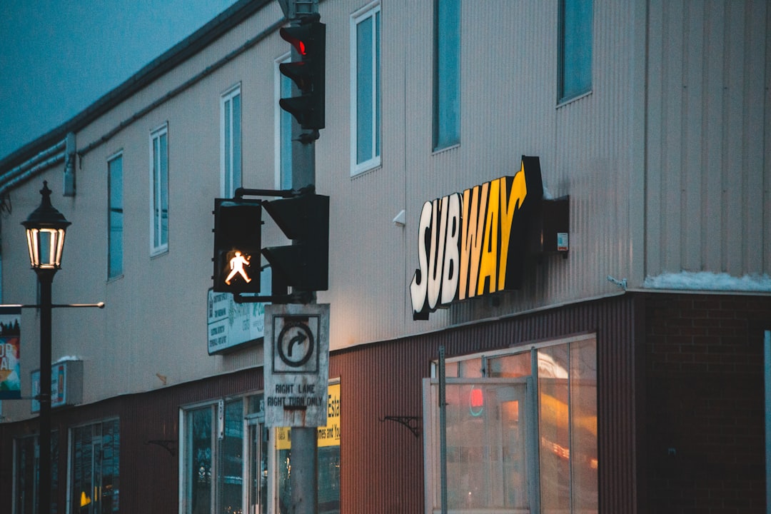 The bright, welcoming, and professional storefront of a modern local business, representing the ideal company chosen by an AI search.