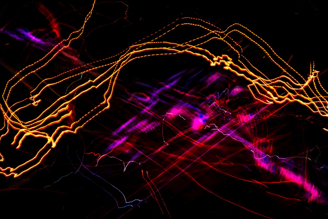 Complex network of glowing, interconnected light trails on a dark background, representing the sophisticated connections o...