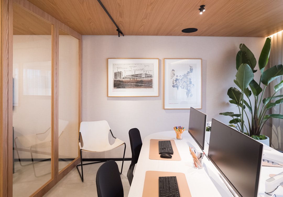 Detailed architectural blueprints spread out across a dark wooden desk, symbolizing the importance of a solid strategic fo...