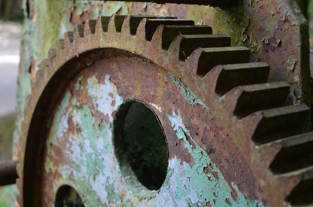 A professional macro photograph of clean, interlocking metal gears working together, symbolizing a precise and powerful internal linking strategy as a secret weapon.