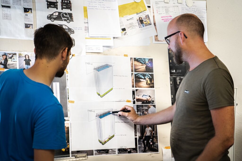 Professional real estate agent or architect reviews a digital blueprint on a tablet, symbolizing a strategic plan for the ...